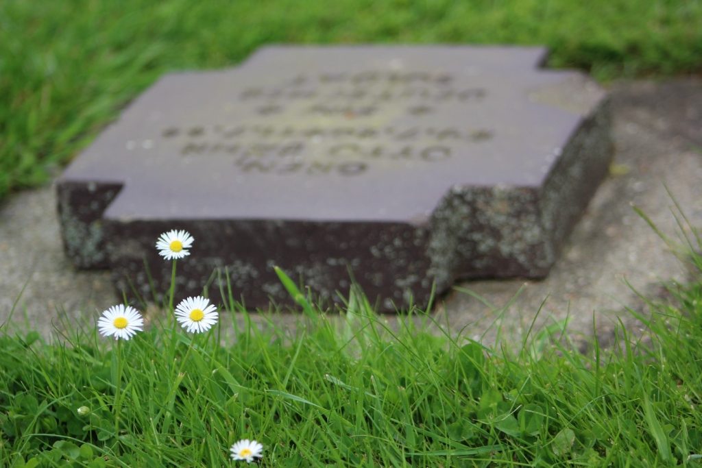 A German Tombstone with Flowers 